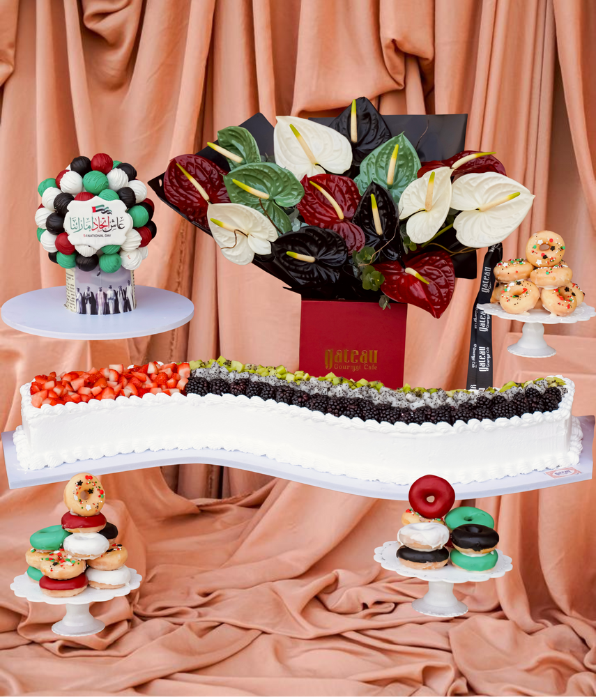 Gourmet cake with colorful fruit decorations and sweet dessert I7tifal arrangement for celebrations