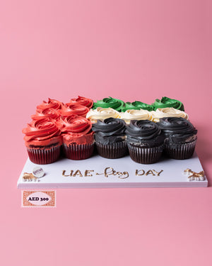 UAE Flag Day cupcakes by Gateau Gourmet Cafe with red, green, white, and black frosting arranged in flag colors