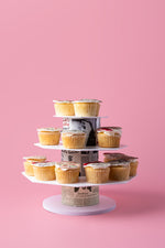 UAE-themed cupcake stand featuring a tiered design with colorful cupcakes for festive celebrations