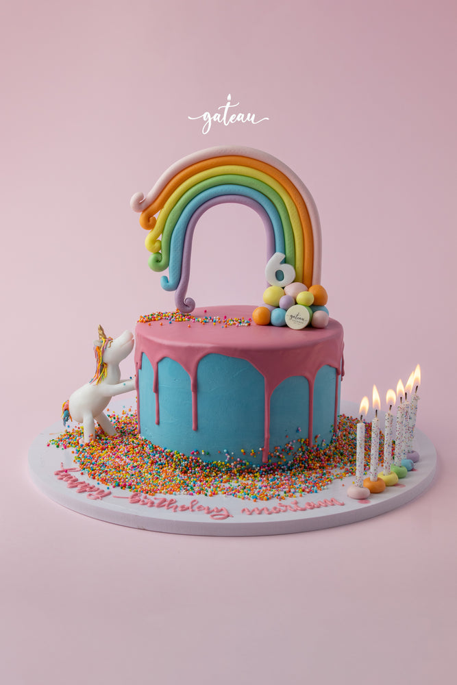 Gateau Gourmet Cafe Unicorn Rainbow Cake for birthdays with rainbow, unicorn, and colorful sprinkles