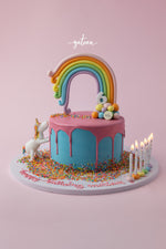 Gateau Gourmet Cafe Unicorn Rainbow Cake for birthdays with rainbow, unicorn, and colorful sprinkles
